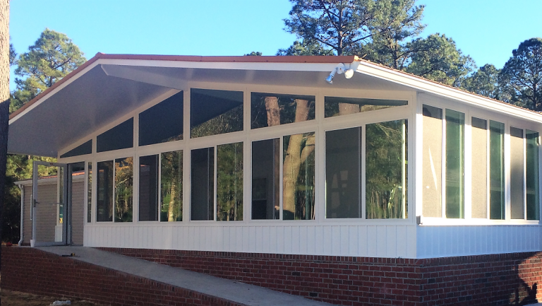 Custom aluminum-framed sunroom installed on a southeast Georgia home near Hazlehurst.