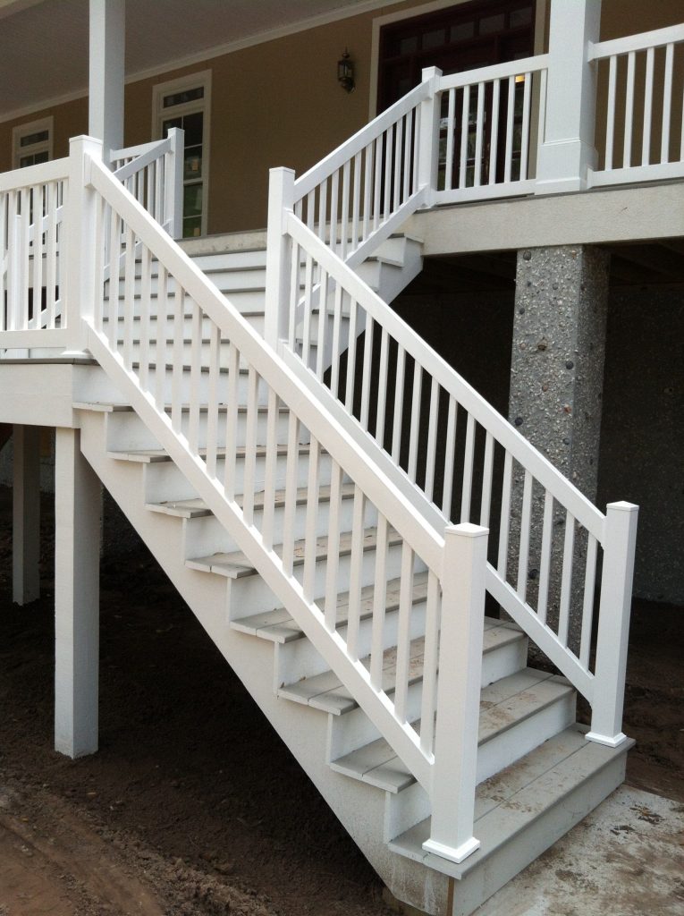 Covered wooden porch with decorative columns on a Guyton Georgia home in Effingham County.