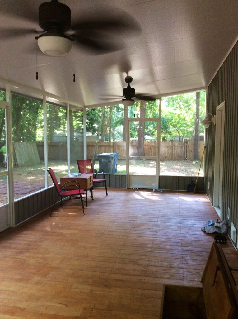 Aluminum-framed screen room on a coastal Georgia home near Jekyll Island with salt-air-resistant framing.