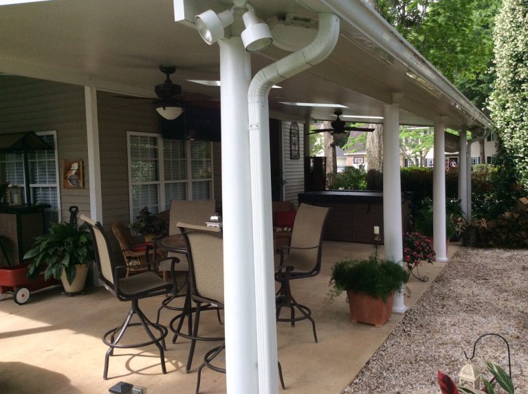 Custom insulated patio cover with ceiling fan on Evans County home near Claxton.