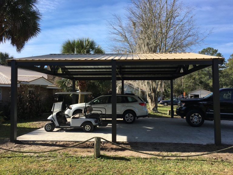 Aluminum patio cover with ceiling fan installed on a Darien Georgia home near the Altamaha River coast.