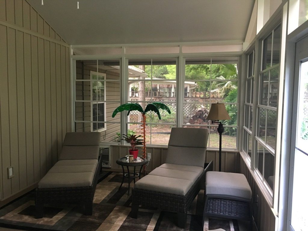 Vinyl glazed porch enclosure on a Brunswick Georgia home near the Georgia coast in Glynn County.