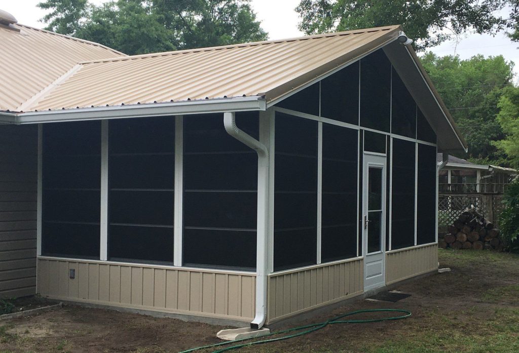 Vinyl glazed enclosure panels installed on a Brunswick Georgia home with coastal salt-air exposure.