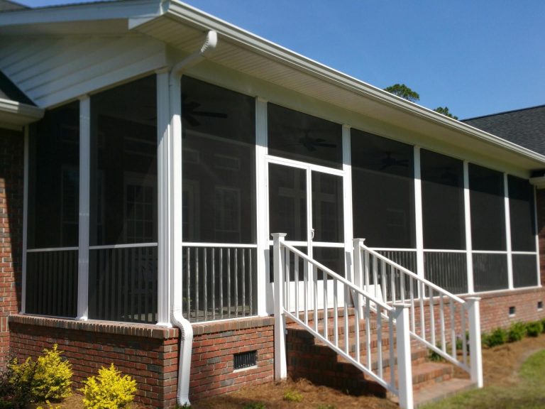 Eicher's Pro Vinyl screen room addition on an Effingham County home with high tree canopy and summer shade.