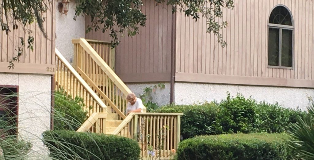 Wooden Decks and Porches in St. Marys, GA by Eicher's Pro Vinyl 2 Covered wood porch with railings built by Eicher's Pro Vinyl in St. Marys Georgia near the St. Marys River waterfront.