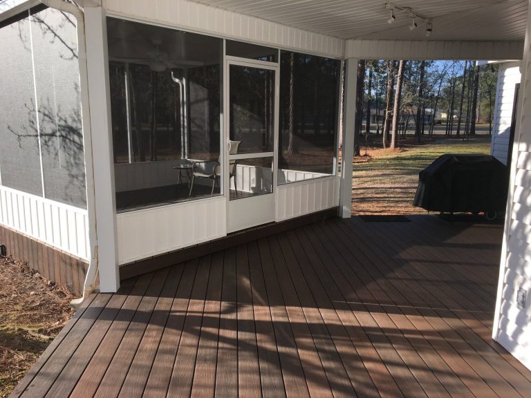Wooden Decks and Porches in St. Marys, GA by Eicher's Pro Vinyl 3 Custom wooden deck built for St. Marys Georgia home surrounded by high tree canopy and humidity.