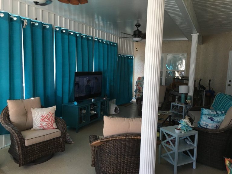 Solid-roof sunroom in Evans County Georgia with metal roofing panels for heavy rain and debris.