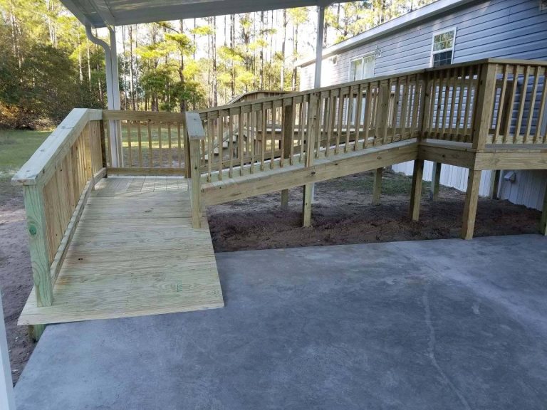 Covered screened porch with gable roof on Blackshear Georgia home.