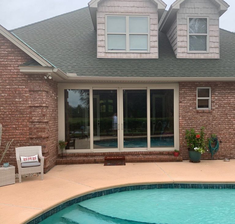 Vinyl replacement windows with 20/20 gnat-resistant screens fitted in a southeast Georgia home near Claxton.