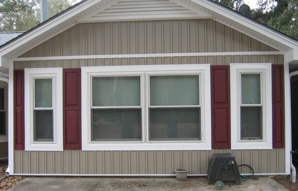 St. Marys Georgia home with vinyl siding and metal roof in humid coastal climate.