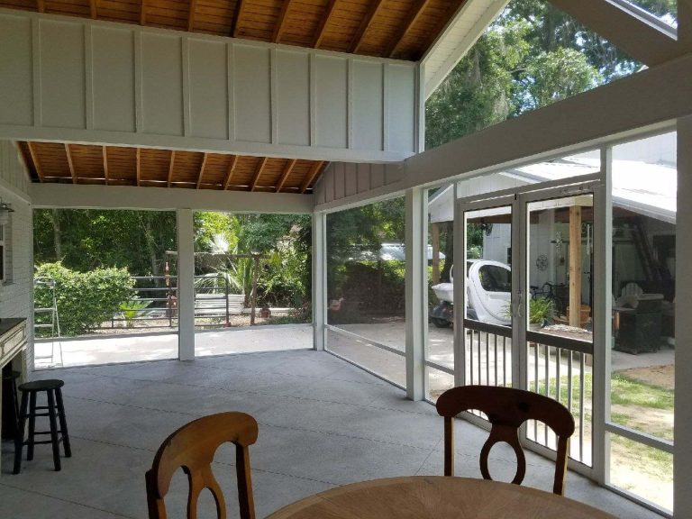 Pierce County Georgia back porch enclosed as a screened outdoor living room by Eicher's Pro Vinyl team.