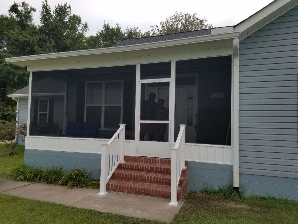 Screen room addition shading a Blackshear Georgia patio on a hot southeast Georgia summer afternoon.
