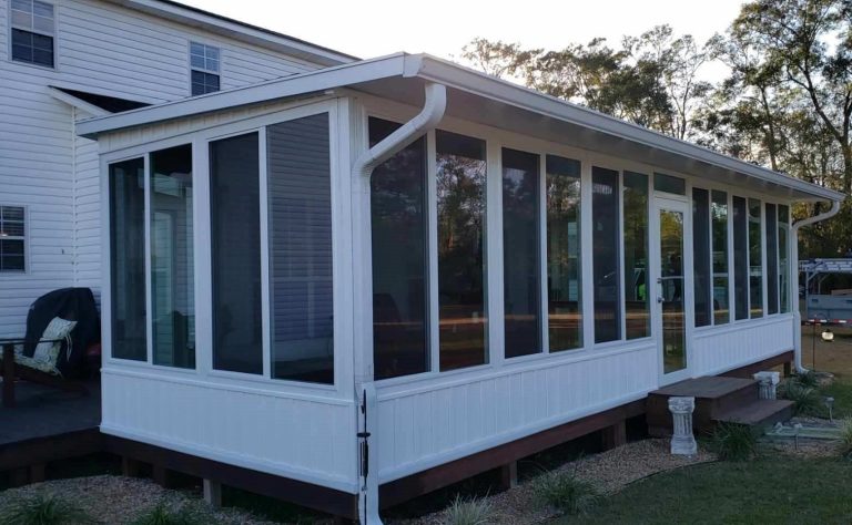 Aluminum-framed three-season sunroom addition on a southeast Georgia home near Hinesville.