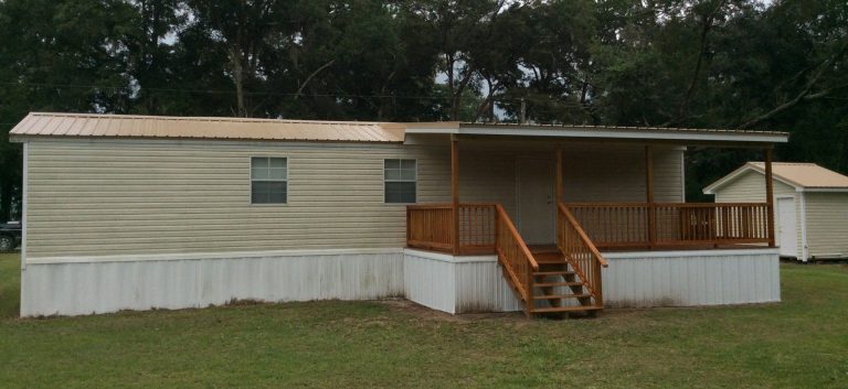 Covered wooden porch built for Hazlehurst Georgia heat and 157 annual mosquito days