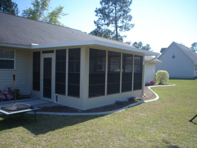 Custom 10-mil vinyl glazed sliding panels installed on a Brantley County screened porch.