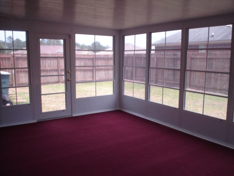 Clear 10-mil vinyl panel enclosure on a screened porch in southeast Georgia near Lyons.