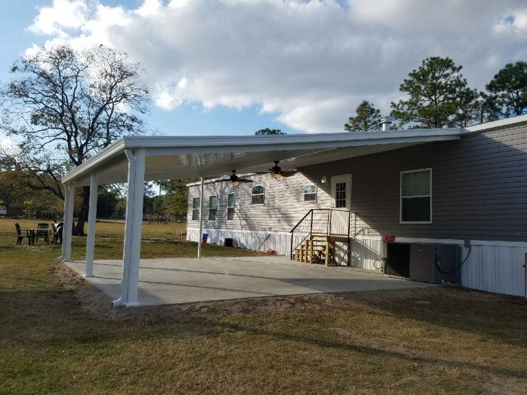 Steel pan roof patio cover shading outdoor furniture from Springfield Georgia summer heat