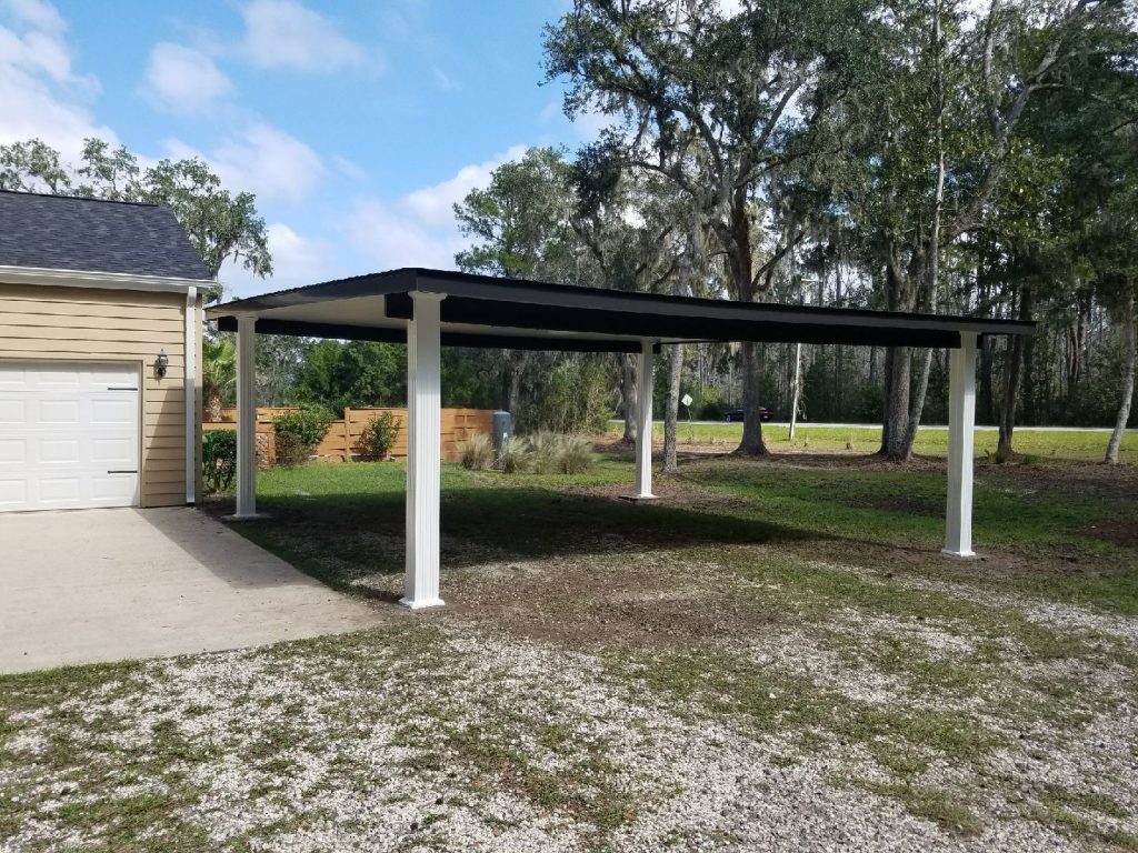 Insulated patio cover installed in Reidsville GA shading homeowners from 91-degree Tattnall County heat