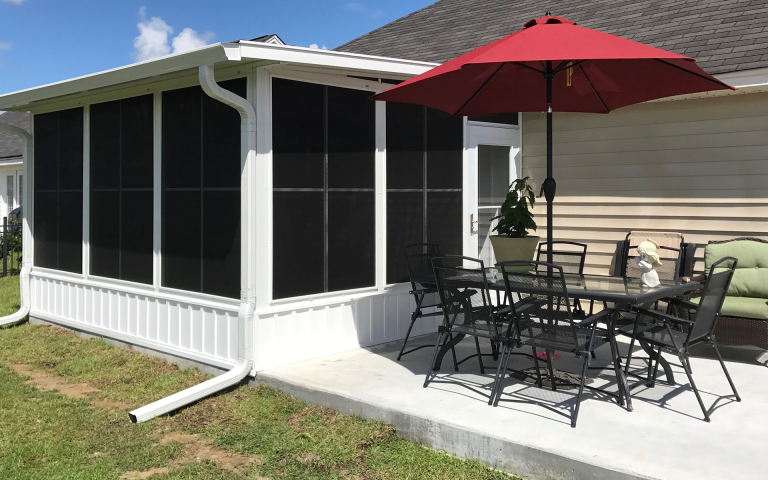 Vinyl glazed sliding panels installed on a Pierce County screen enclosure.