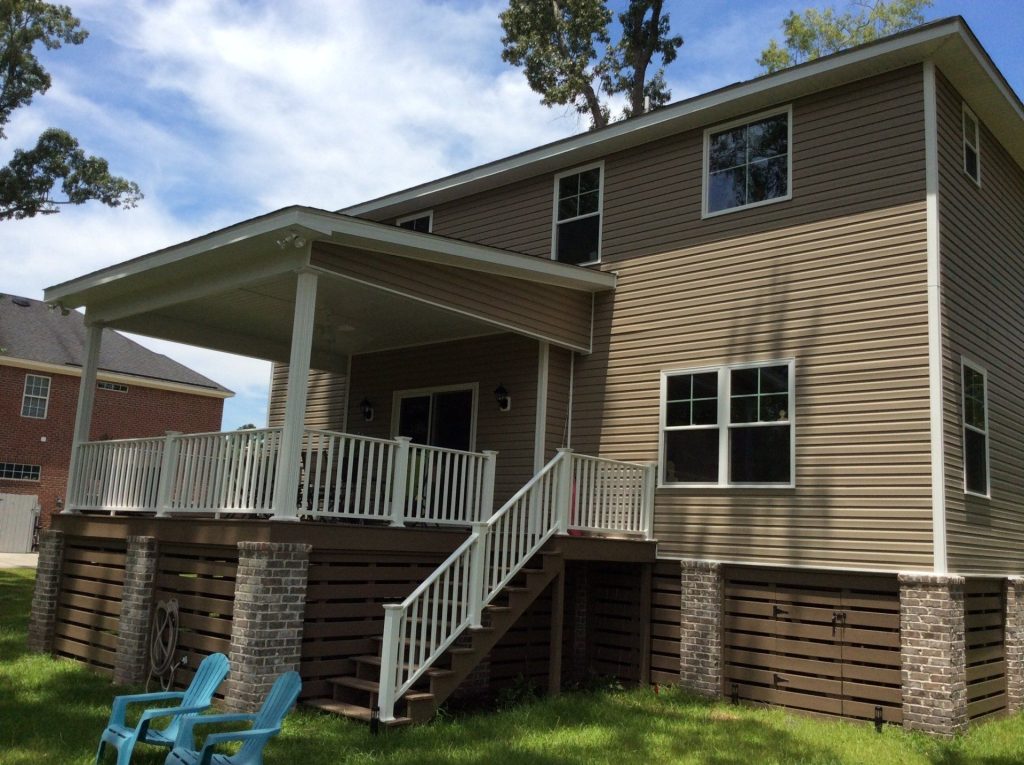 Color Through vinyl lap siding installed on a Pierce County home in hot southeast Georgia summer.