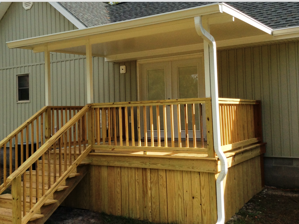 Insulated patio cover shading a Glennville Georgia backyard during a 91-degree summer afternoon.
