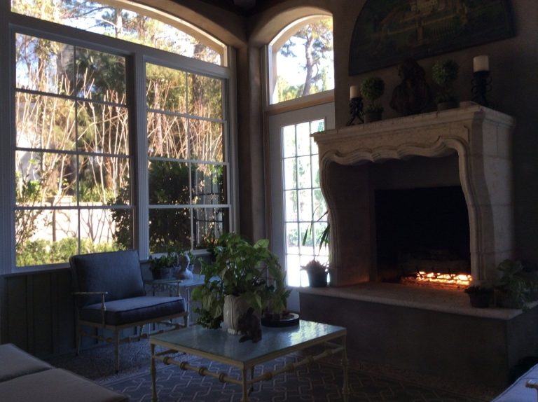 Custom vinyl glazed sliding panels installed on an Effingham County screened porch.