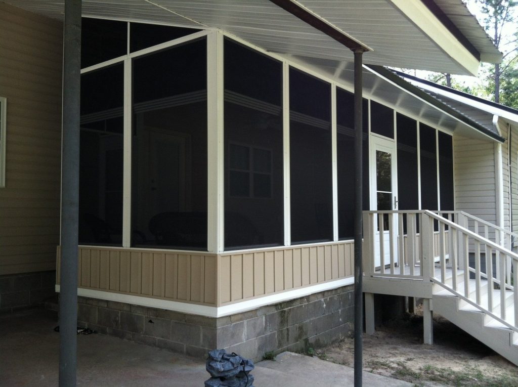 Vinyl glazed track panel enclosure on a Darien Georgia porch near the Altamaha River waterfront