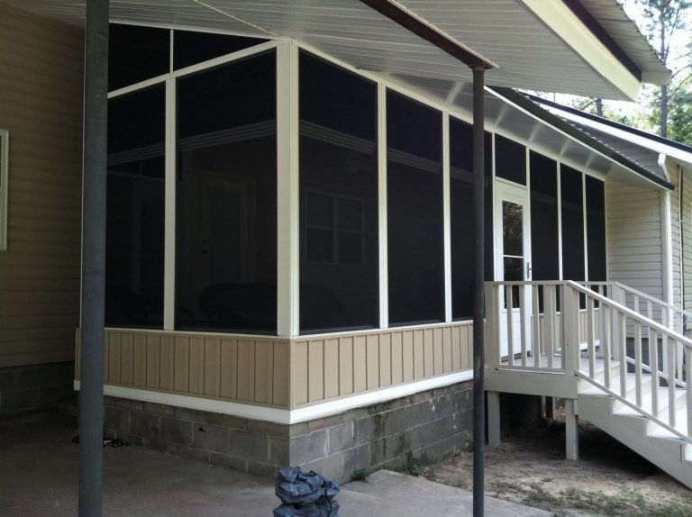 Vinyl glazed track panel enclosure on a Darien Georgia porch near the Altamaha River waterfront