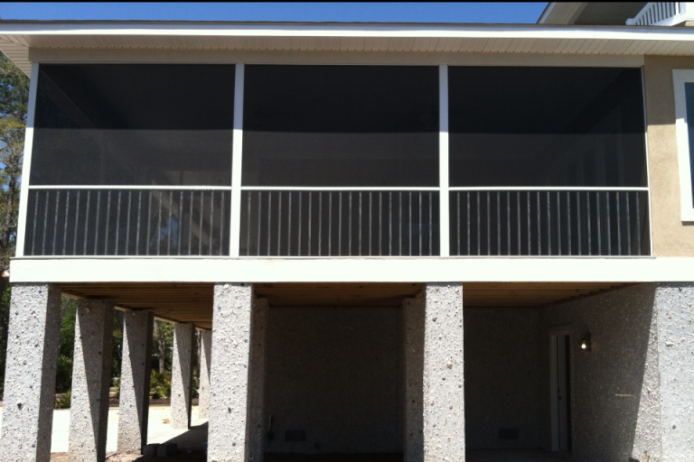 Aluminum-framed screen room addition on a Richmond Hill Georgia home with gnat-resistant screening.