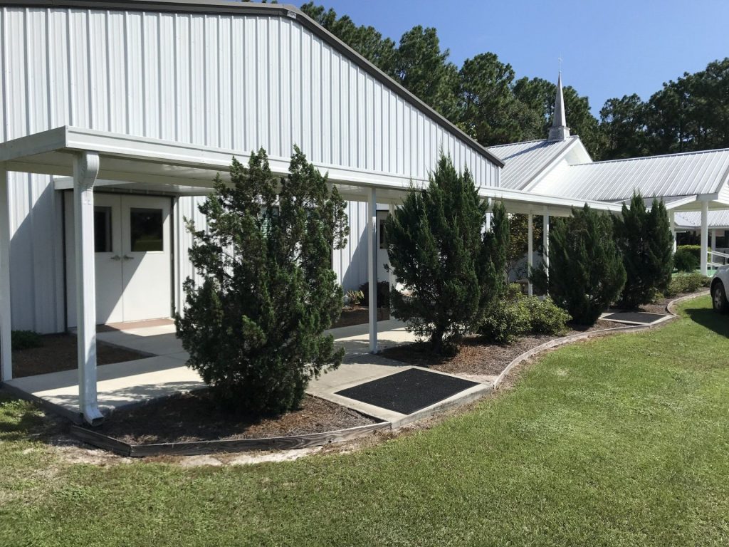 Insulated patio cover installed on a Pierce County Georgia home on a hot summer afternoon