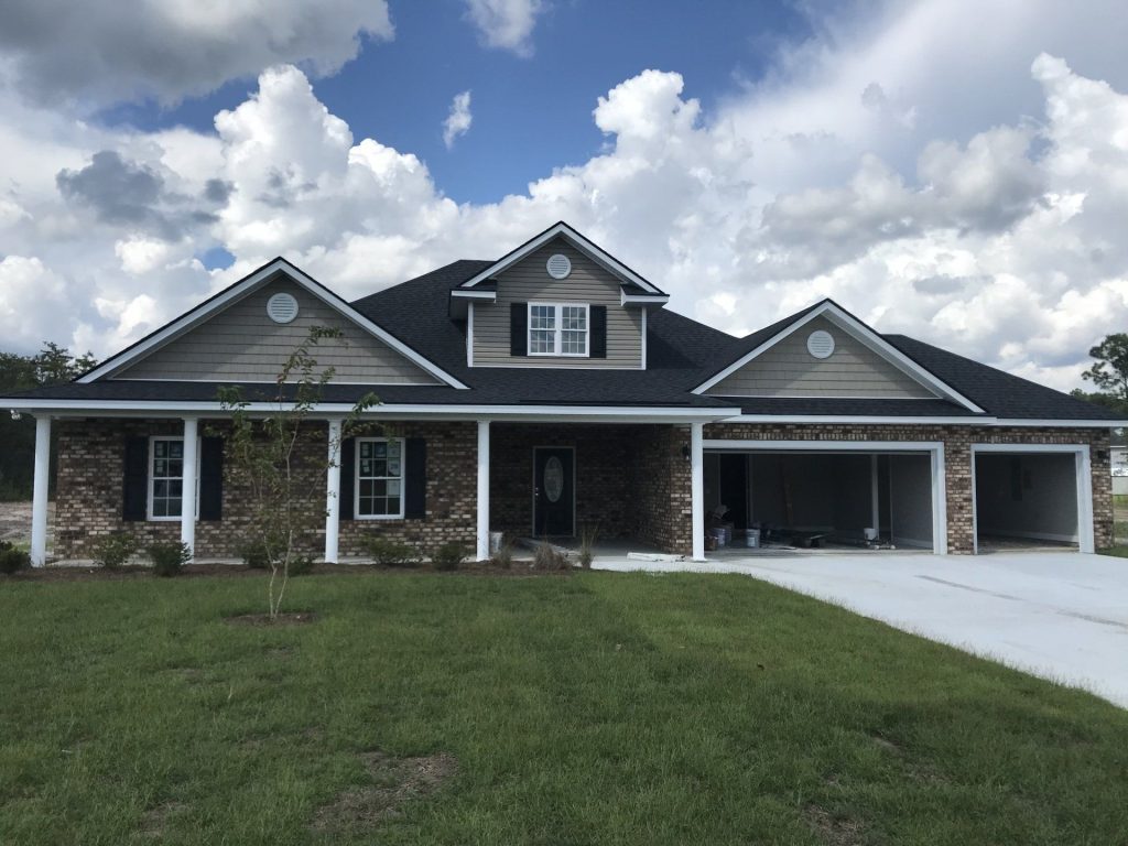 Replacement vinyl siding on a mid-1980s Evans County home near Claxton Georgia.