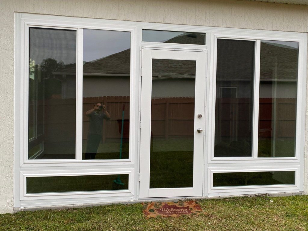 Sunrooms in St. Simons, GA by Eicher's Pro Vinyl 2 Custom sunroom on a St. Simons Island home with gnat-resistant screens and coastal glazing panels.