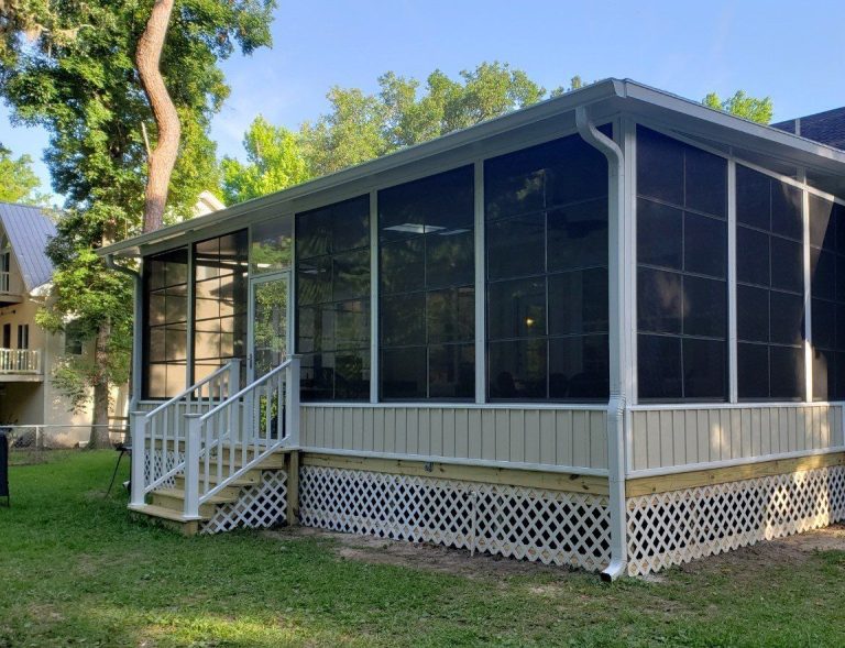 Vinyl glazed sliding panel enclosure on a southeast Georgia porch near Douglas Coffee County.