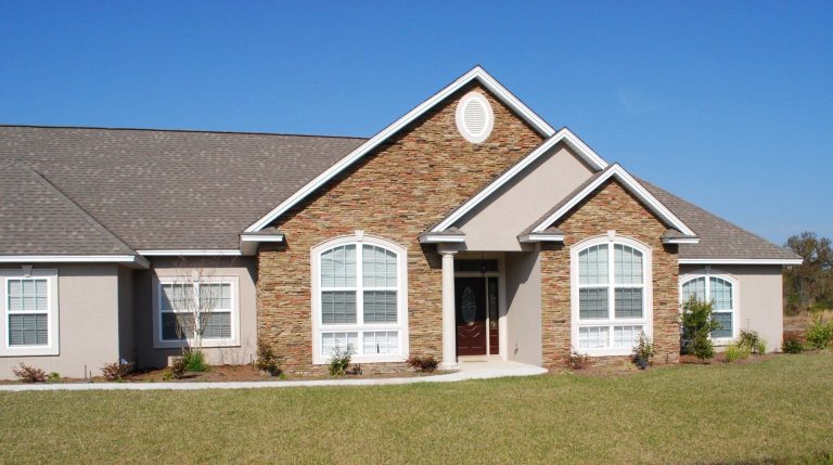 Vinyl soffit and fascia installation completing a siding project near Springfield Georgia.