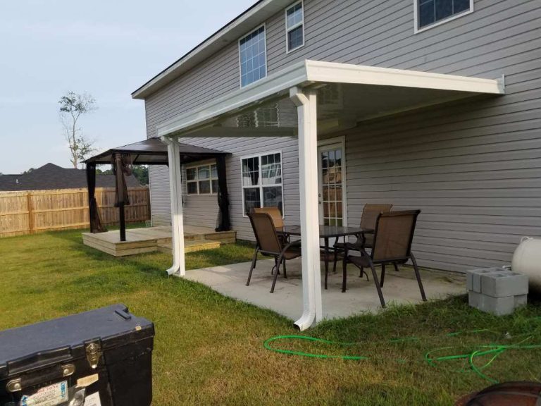 Covered wooden porch with screened panels built near Pooler Georgia.