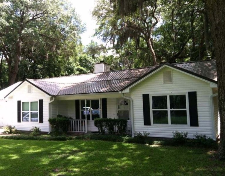 Exposed-fastener metal roof panels on a southeast Georgia home near Blackshear.
