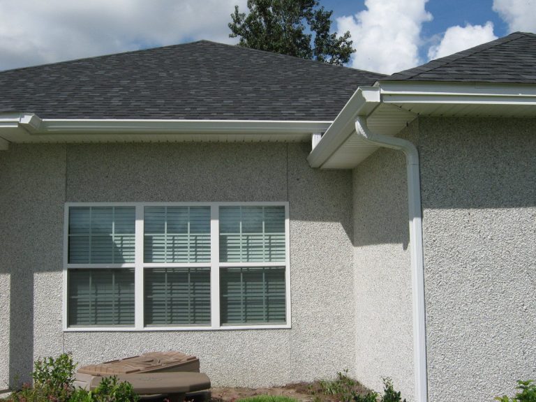 Seamless aluminum gutters installed on a Wayne County home after heavy southeast Georgia rainfall.