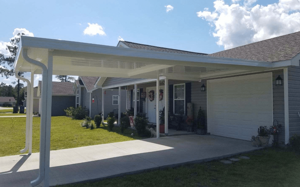 Insulated patio cover shading Jekyll Island home outdoor seating from coastal summer heat and salt air.
