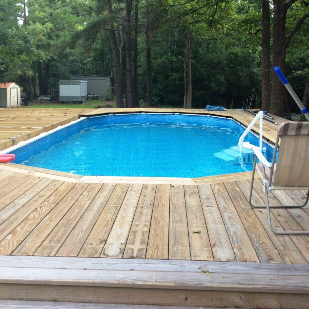 Custom covered porch with decorative columns built for a Richmond Hill Georgia homeowner near Bryan County.