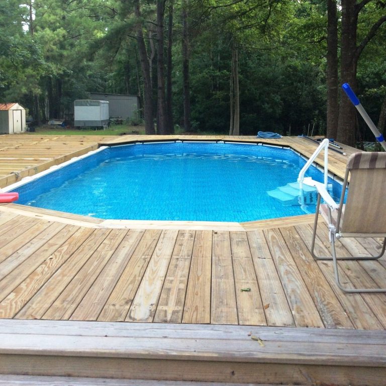 Custom covered porch with decorative columns built for a Richmond Hill Georgia homeowner near Bryan County.