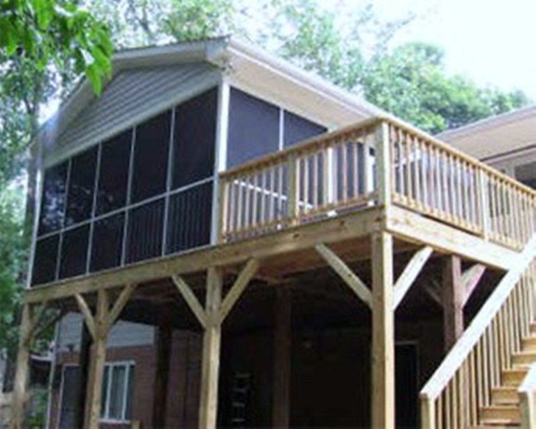 Pressure-treated deck with gable roof built in Chatham County Georgia.